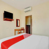 Отель OYO 90302 Wisma Damai, фото 16