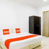Отель Al Gazzaz Furnished Apartment by OYO Rooms, фото 14