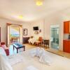 Отель Sunrise Beach Suites в Сиросе