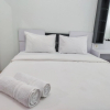 Отель Compact and Cozy Tamansari Mahogany Studio Apartment, фото 12
