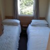 Отель Immaculate 3-bedroom Caravan on Combe Haven, фото 9