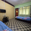 Отель OYO 91042 Kamal Guest House Marang, фото 4