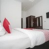 Отель OYO 346 Guest House Dempo Jakabaring, фото 10