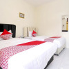 Отель OYO 1366 Kayoman Family Homestay, фото 19