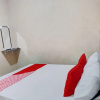 Отель OYO 92826 Penginapan Syariah Faster Inn, фото 13