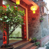 Отель Fenghuang Xinzhuge Inn, фото 1