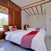Отель OYO Life 91201 Larasati Homestay Pantai Klayar, фото 6