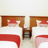 Отель OYO 236 Penginapan Rumah Hijau, фото 13