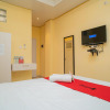 Отель RedDoorz Plus Syariah near Pasar Turi, фото 11
