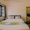 Отель OYO 24035 Home La Indiana Morjim, фото 8