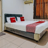 Отель OYO 92726 Geulis Guest House Syariah, фото 3
