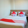 Отель OYO 984 Maleo Guest House, фото 4