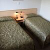 Отель Harbour City Motor Inn, фото 4