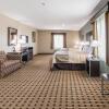 Отель Scottish Inns & Suites, фото 2
