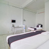 Отель Capital O 91466 Hotel Neu Backpacker Tf Syariah (smk Tb), фото 16