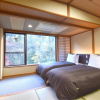 Отель Nekonaki Onsen Shikibu No Yakata Izutsuya, фото 4