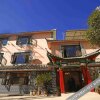 Отель Xinniu Inn (Lijiang Ancient City Dashuiche Shop), фото 13
