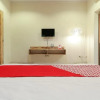 Отель OYO 817 Mesari Beach Inn, фото 4