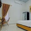 Отель OYO 92708 Hotel Mufasa Syariah, фото 18