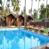 Отель Stone Wood Village Resort - Morjim Beach, фото 10