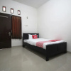 Отель Wisma Ray Syariah by OYO Rooms, фото 20