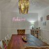 Отель Charming Pink Haus 1 Mile to Main St With Firepit!, фото 2