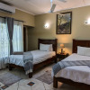 Отель Room in Villa - Zambezi Family Lodge - Buffalo Room, фото 4