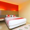 Отель Tiga Dara Kampung Wisata Hotel & Resor by OYO Rooms, фото 12