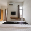 Отель Super OYO Collection O 90023 Damar Kusumo Guest House, фото 9