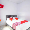 Отель OYO 1064 Manado Airport Homestay, фото 13