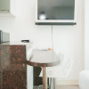 Отель Homey And Cozy Studio Room At Tree Park City Bsd Apartment, фото 5