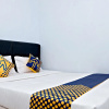 Отель SPOT ON 2847 Anggrek Homestay Syariah, фото 4