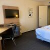 Отель SleepBEEONE AIRPORTHOTEL FRANKFURT-MÖRFELDEN, фото 4