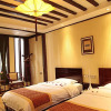 Отель Lijiang Xiangxue Mushe Boutique Inn, фото 2
