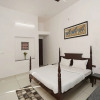 Отель OYO 9723 Home Farm Stay Connaught Palace, фото 12