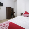 Отель Oyo 659 Kost And Home Stay Wisma Mulia, фото 2