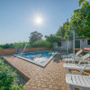 Отель Nice Bungalow With Shared Swimming Pool and Enclosed Garden With Bbq, Pula 5 km Away, фото 12