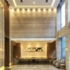 Отель Qianmen Holiday Inn (Zhuhai City Rail Mingzhu Station), фото 1