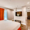 Отель Orangewood Suites, фото 7