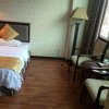 Отель Xingyi Longtai Inn, фото 1