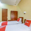 Отель OYO 91036 Hotel Simpang Lima Gkpri, фото 6
