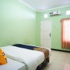 Отель Spot On 2729 Marzan Syariah Guest House, фото 3