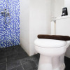 Отель Homey And Tidy 2Br At Puri Mas Apartment, фото 13
