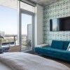 Отель 24th floor condo on Rainey St by Locale, фото 5