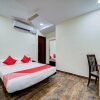 Отель OYO 15932 Flagship Malkajgiri, фото 4