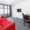 Отель City Edge Serviced Apartments East Melbourne, фото 3