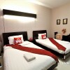 Отель ZEN Rooms Sunshine City Suites, фото 5