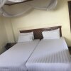 Отель Arusha Tourist Inn Hotel, фото 11