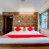 Отель RG Suits & Apartment by OYO Rooms, фото 2
