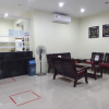 Отель Super OYO 90464 Borneo Suites Hotel, фото 17